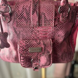 Luxurious designer chrome bones pet carrier. Pink python print. Amazing Rare